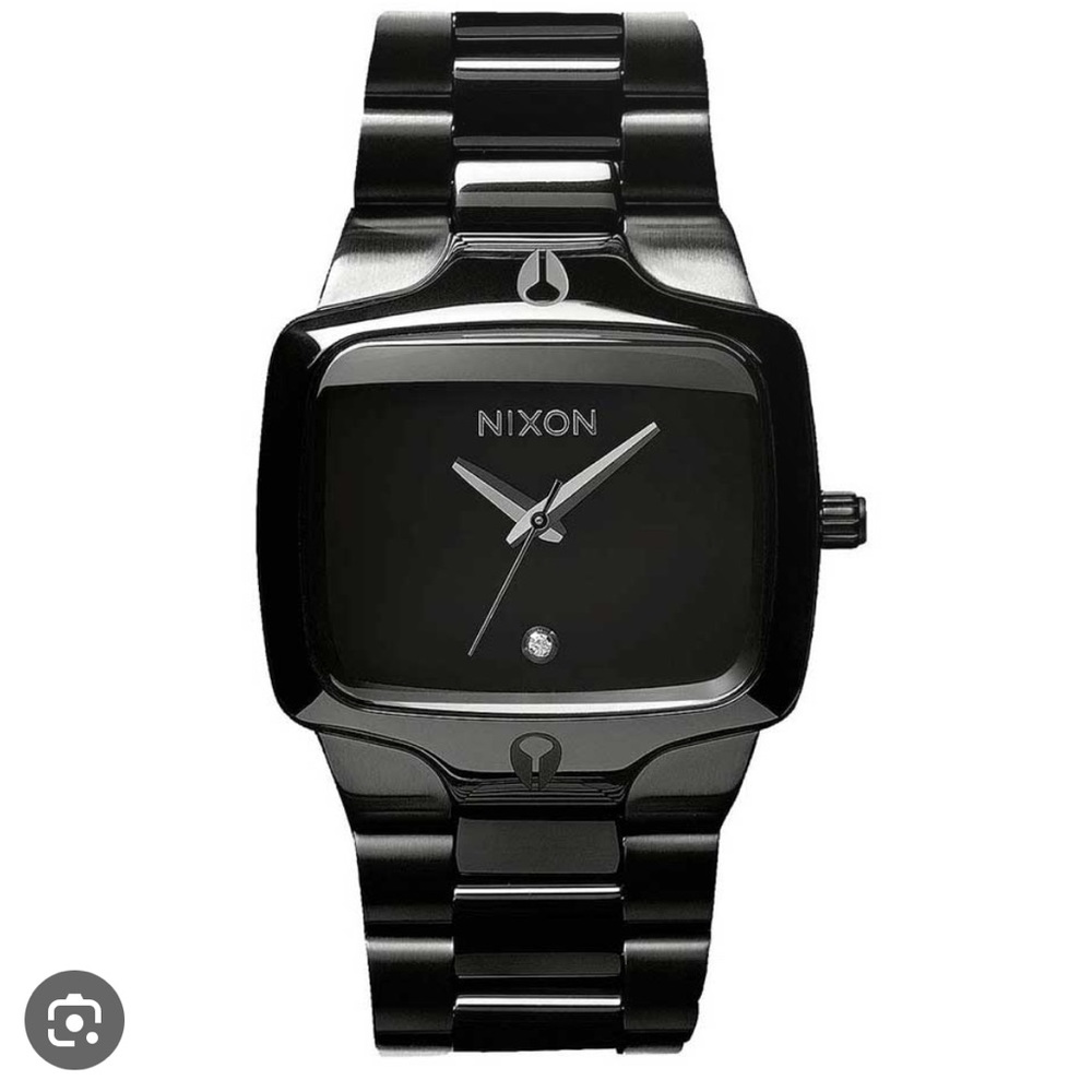 Gently used Nixon “The Player” watch